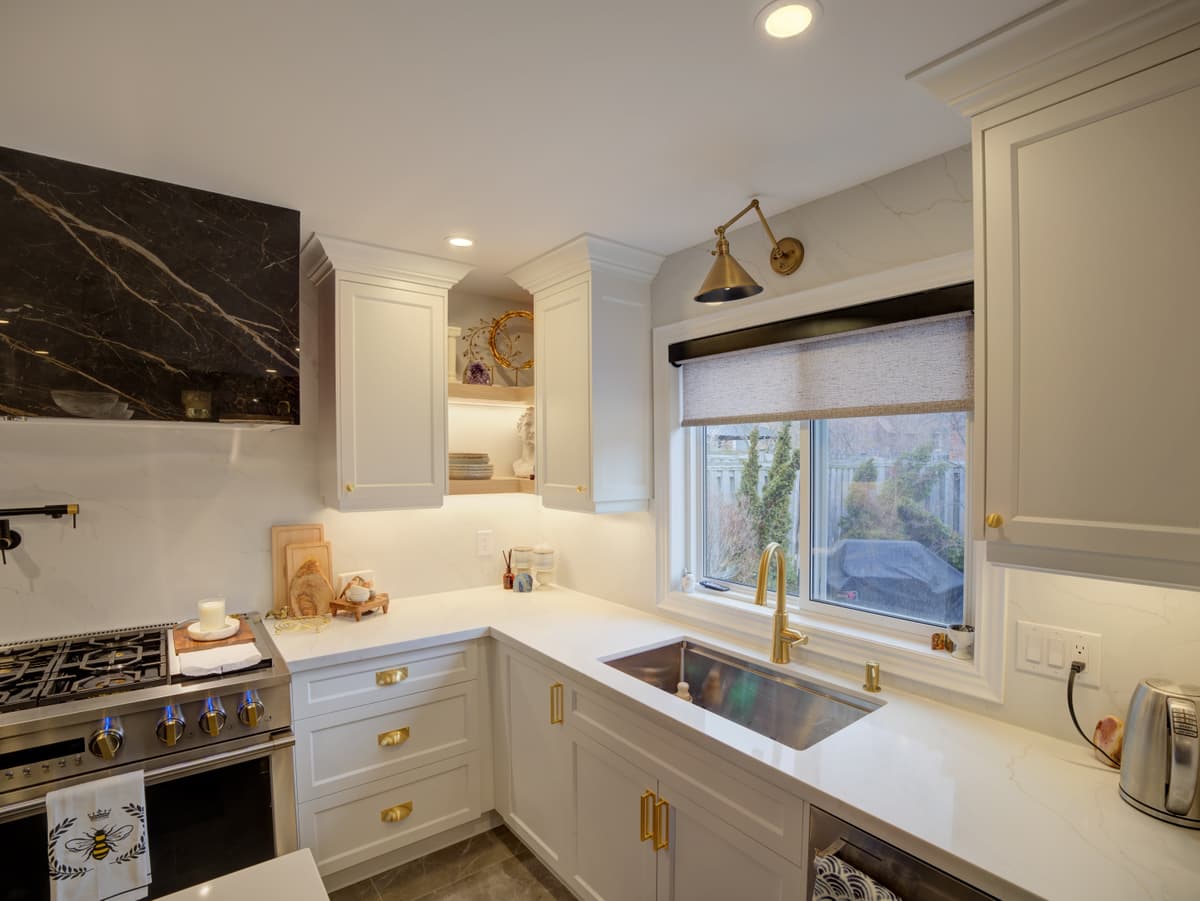 Glass door open shelf cabinets in a Mississauga kitchen renovation