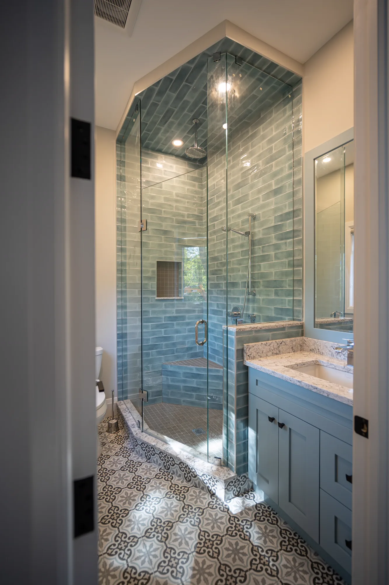 Angled Glass Shower Compact bathroom renovation in Oakville, Ontario